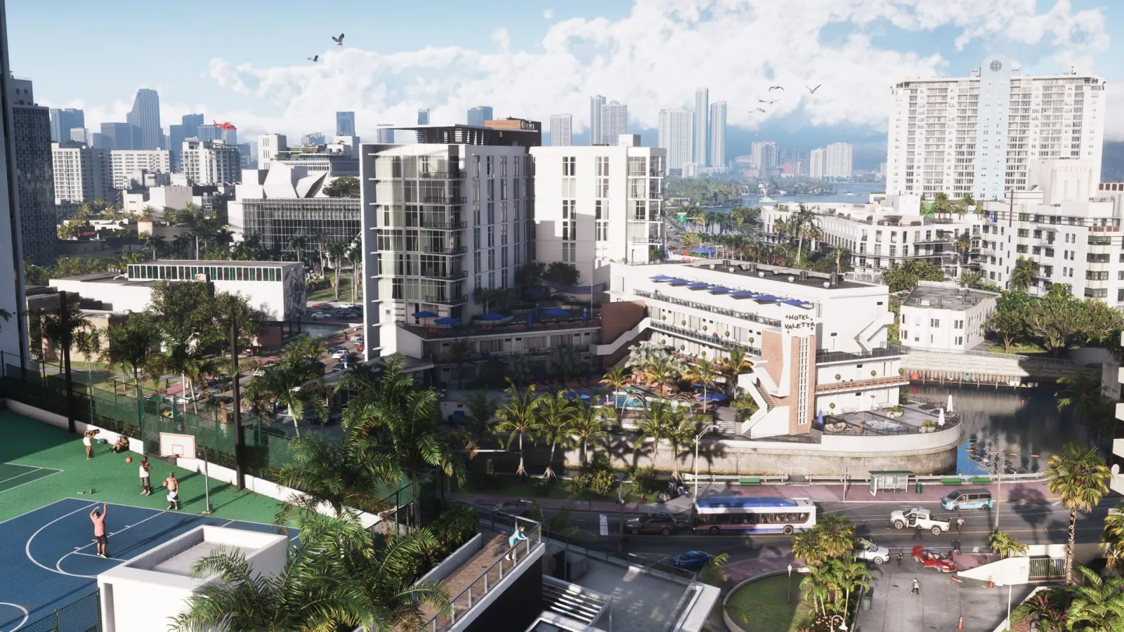 Daytime aerial of Vice City in GTA 6, showing dense blocks and the distant downtown skyline. © Rockstar Games