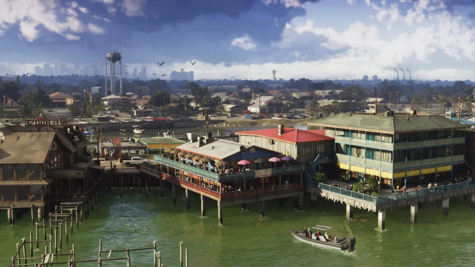 A stilt-house waterfront town on green wetland water in GTA 6, with Vice City's skyline on the distant horizon